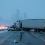 Main causes of semi-truck accidents in Illinois including driver and trucking company negligence